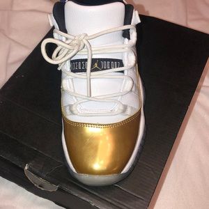 Worn 3 times , Sz 5 gold and white Jordan's